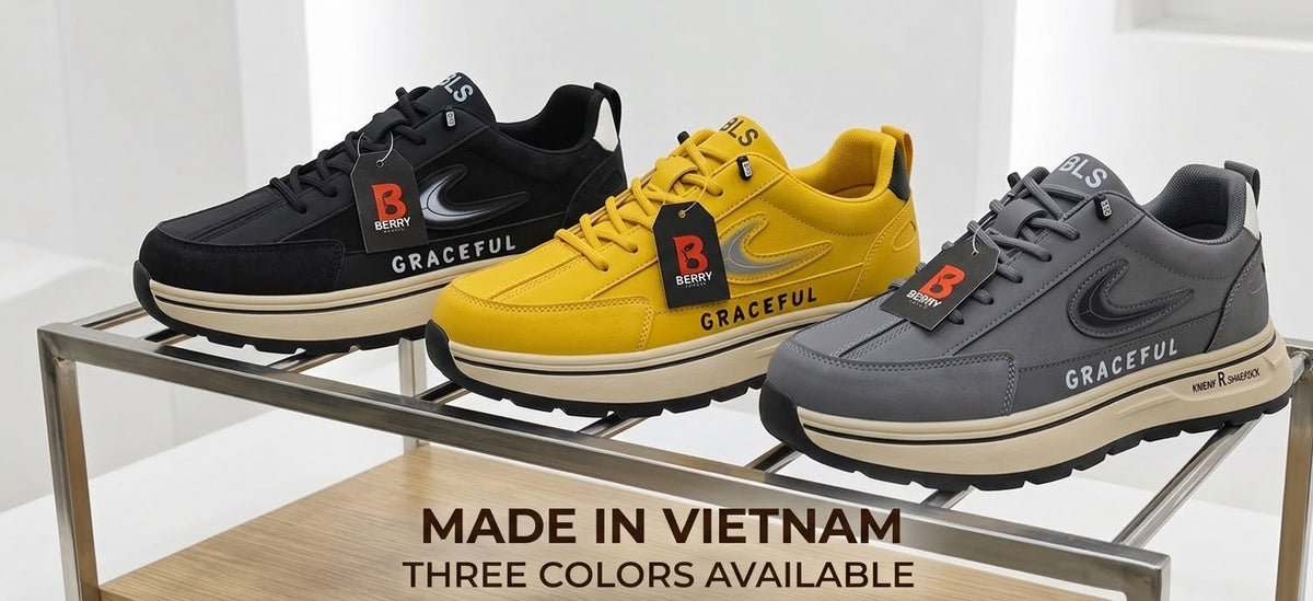 Three Graceful brand sneakers displayed on a metal shelf: black, bright yellow, and dark gray. The image includes text overlays reading 'MADE IN VIETNAM' and 'THREE COLORS AVAILABLE'.